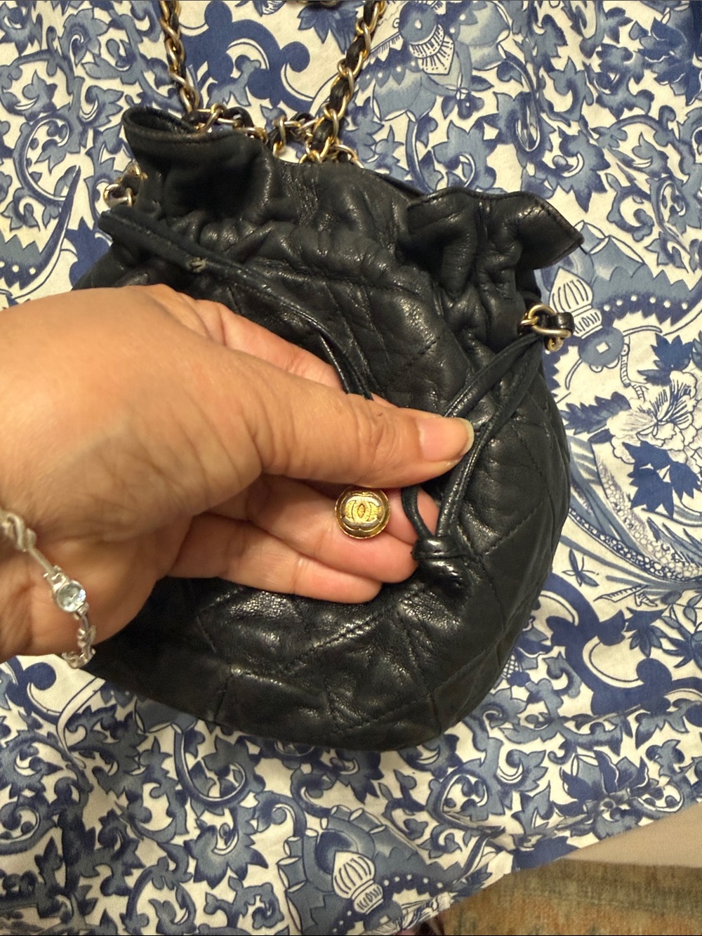 CHANEL Black Quilted Leather Drawstring Mini Shoulder Bag with Gold Chain - Picture 3 of 10